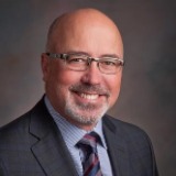 Dr. Mitchell J. Henry