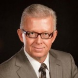 Dr. Carter Abbott